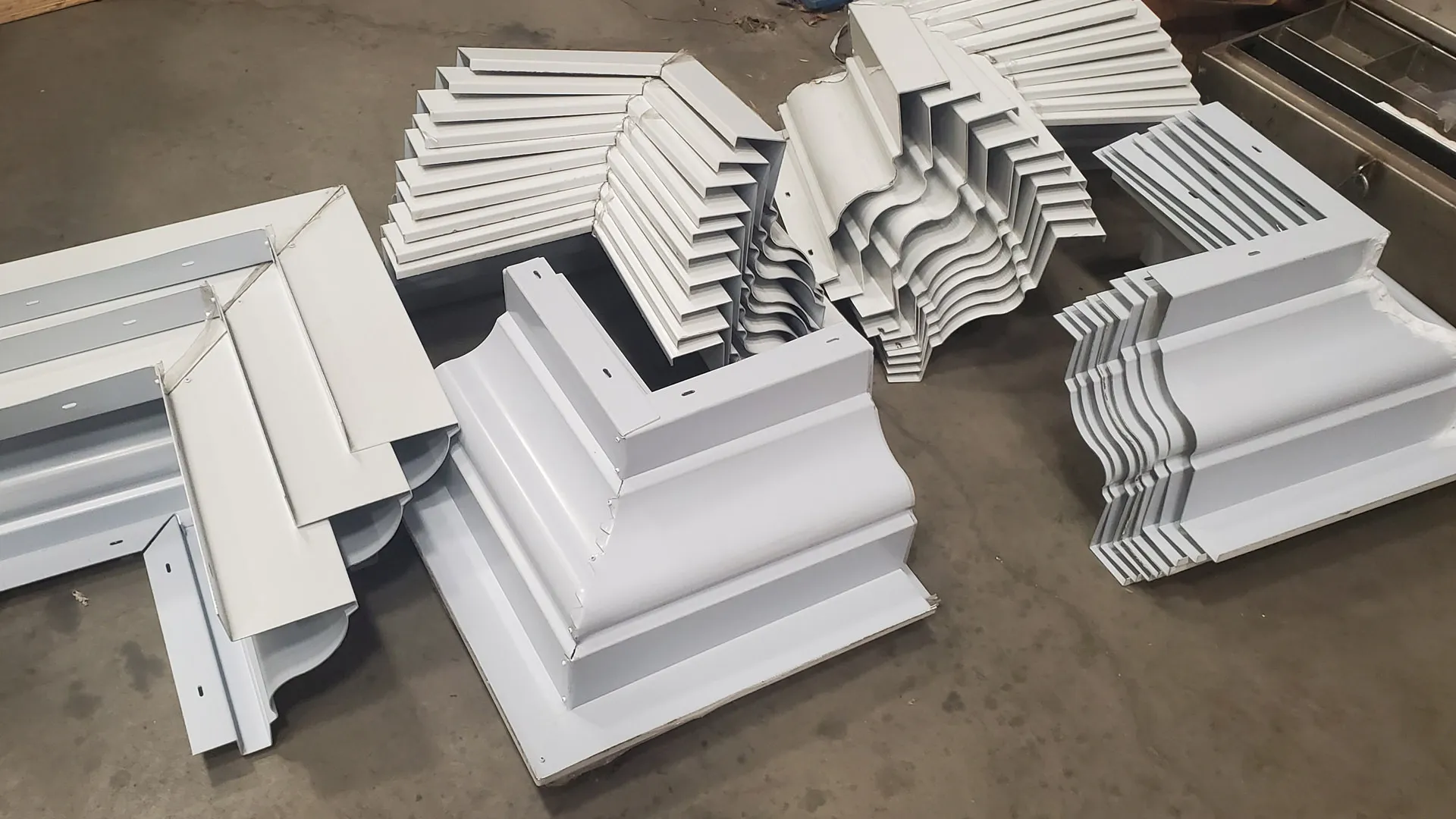 White Kynar-finished aluminum cornice fabrication
