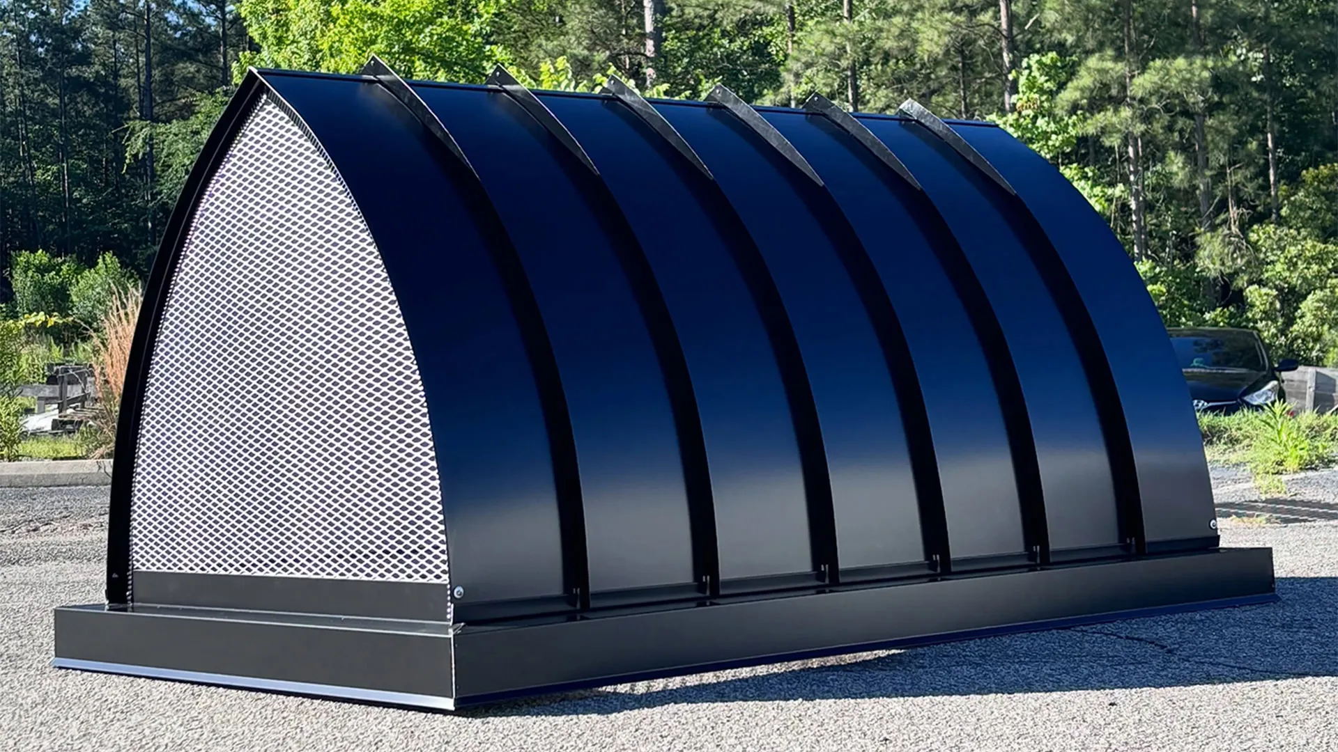 Cathedral roof chimney cap in black Kynar-finished aluminum