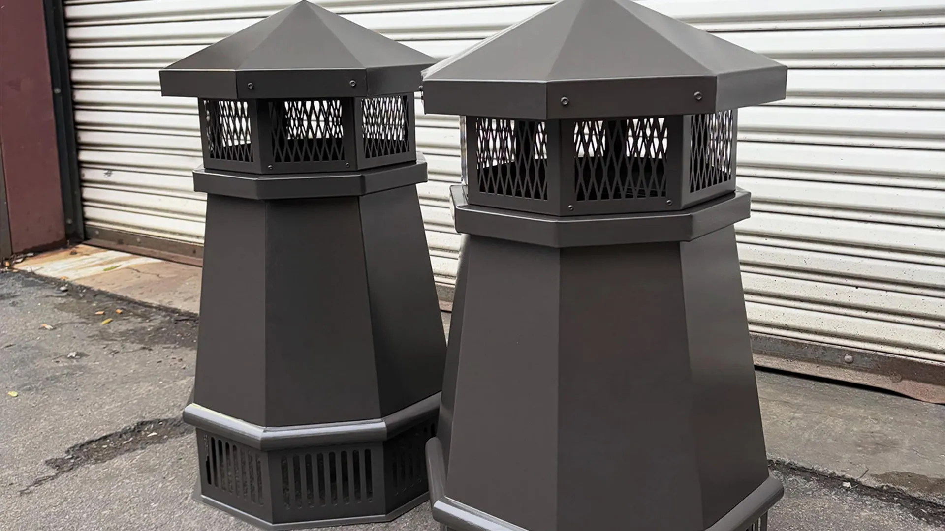 Stainless steel Lighthouse chimney pots with a dark bronze powder-coated finish