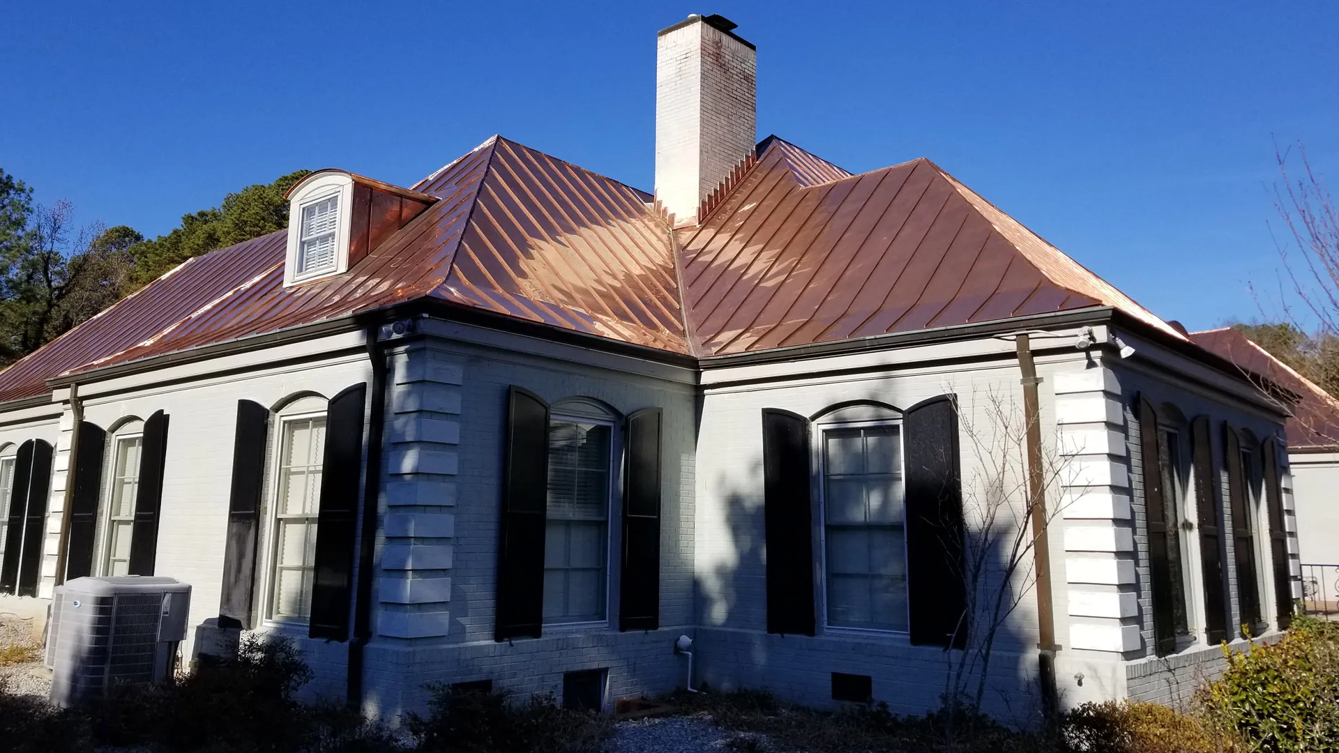 Double Lock Standing Seam Copper Roof Panels and Gutters