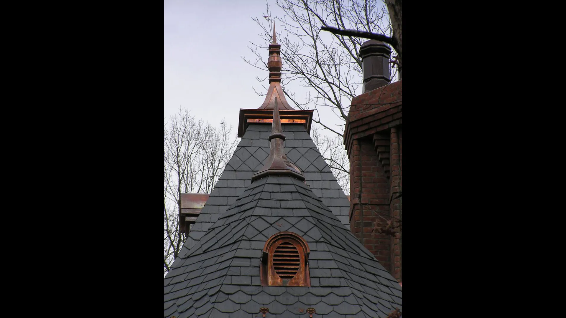 Custom Copper Finials on Slate Roof