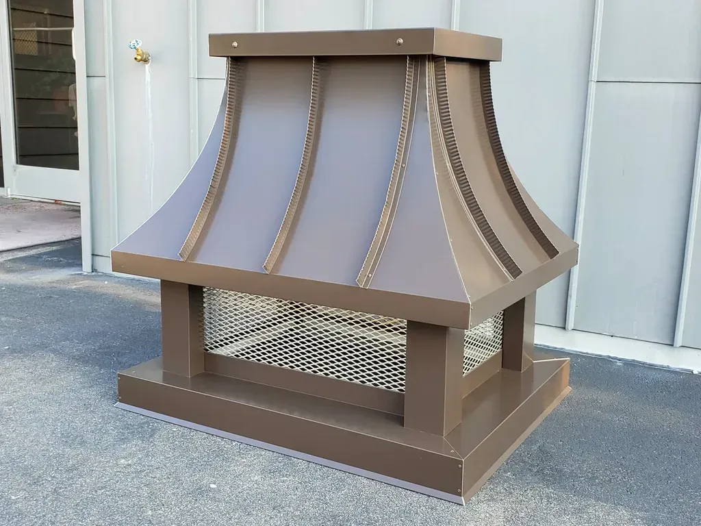 Dark bronze aluminum concave standing seam radius roof chimney cap