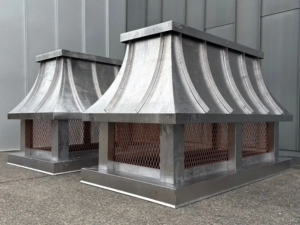 Concave Roof radius chimney caps in lead coated copper