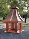 Small concave chimney cap in copper