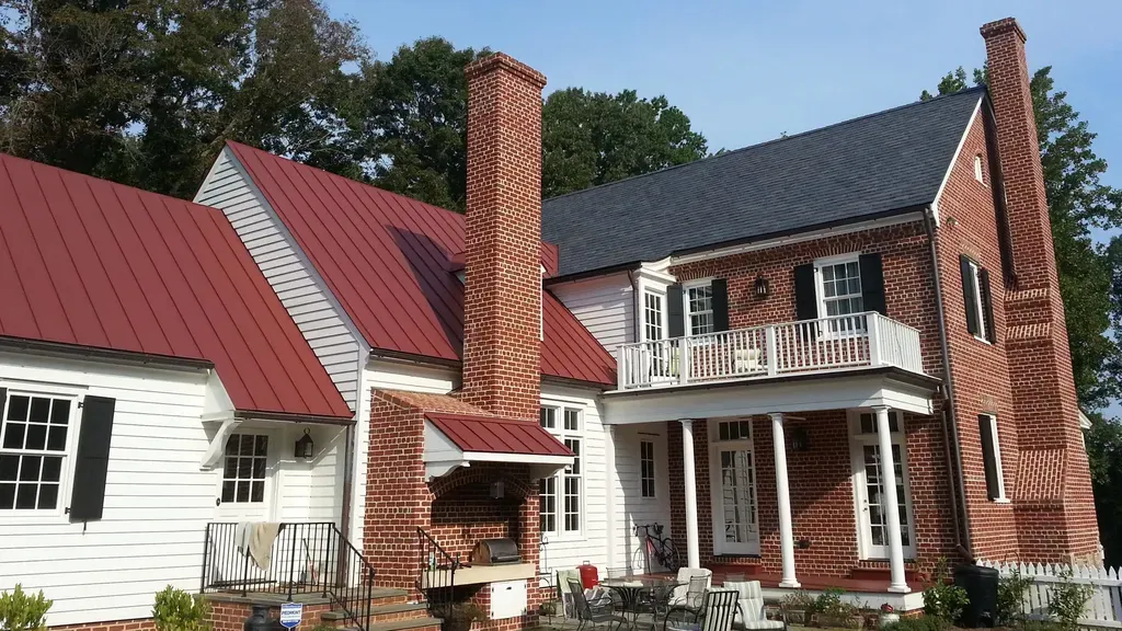 Snap Lock Roofing Panel - Red Panels on a Home