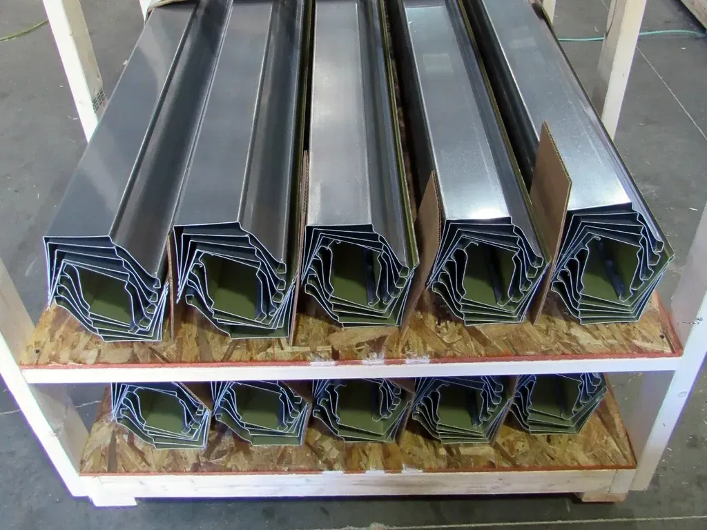 Stack of Aluminum Dark Bronze Gutters