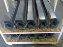 Stack of Aluminum Dark Bronze Gutters